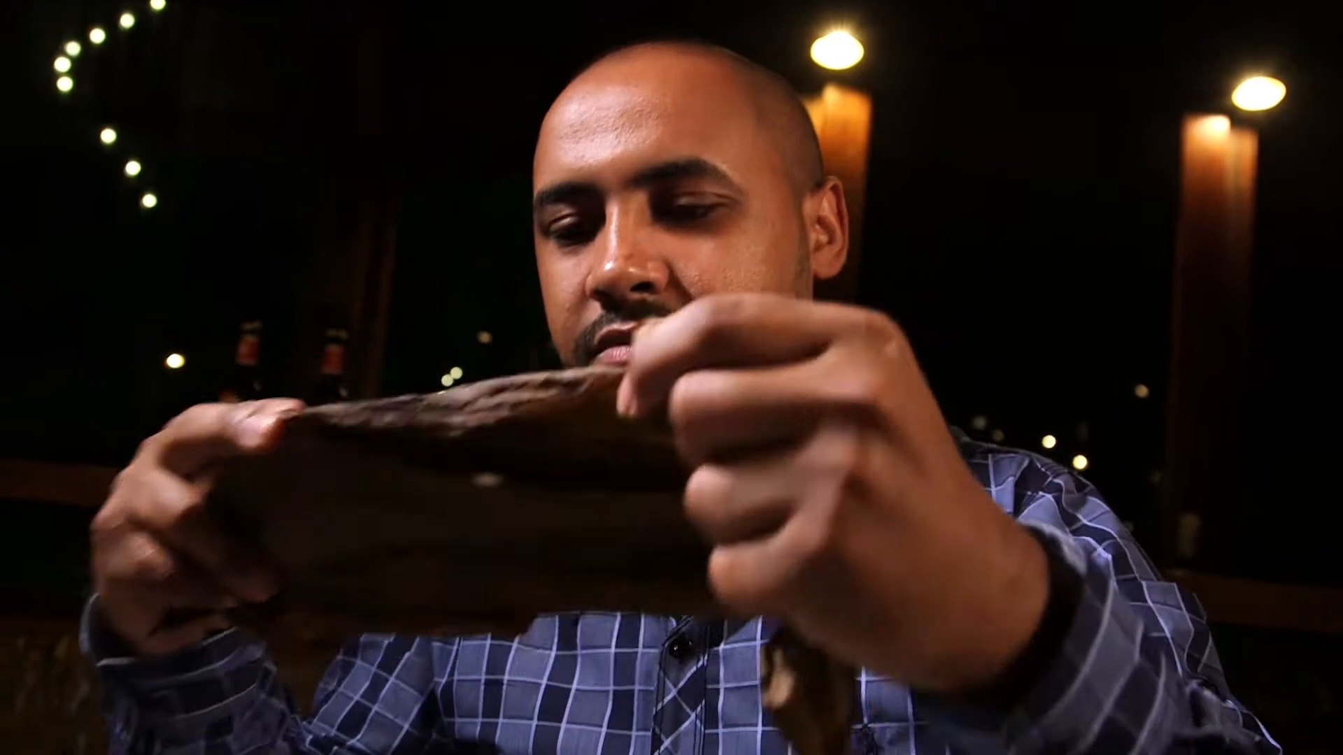 Inspecting a wrapper leaf by hand